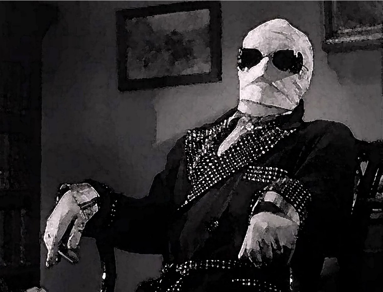 Black and white still of a bandaged figure in dark glasses seated in an armchair